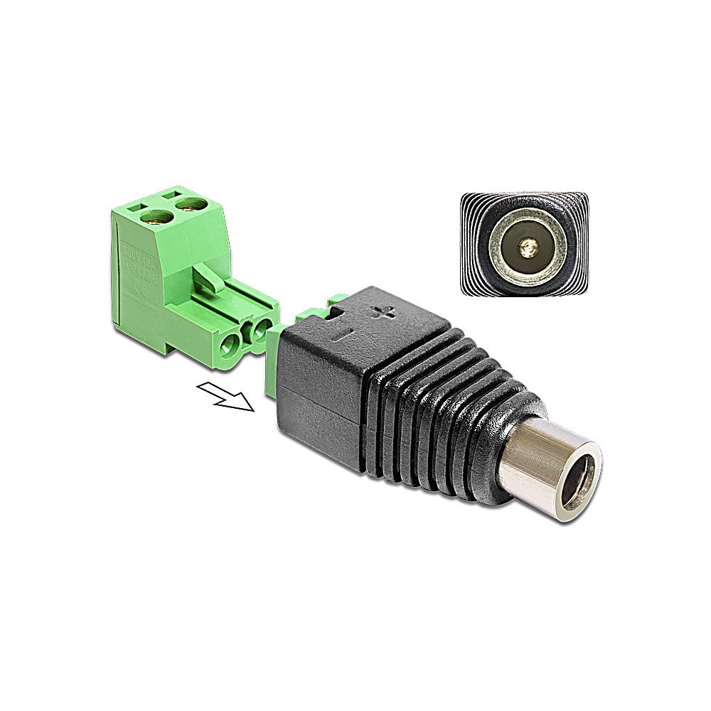 Connettori elettrici verdi e neri. Un morsetto verde è separato da un connettore di alimentazione nero con punta metallica.