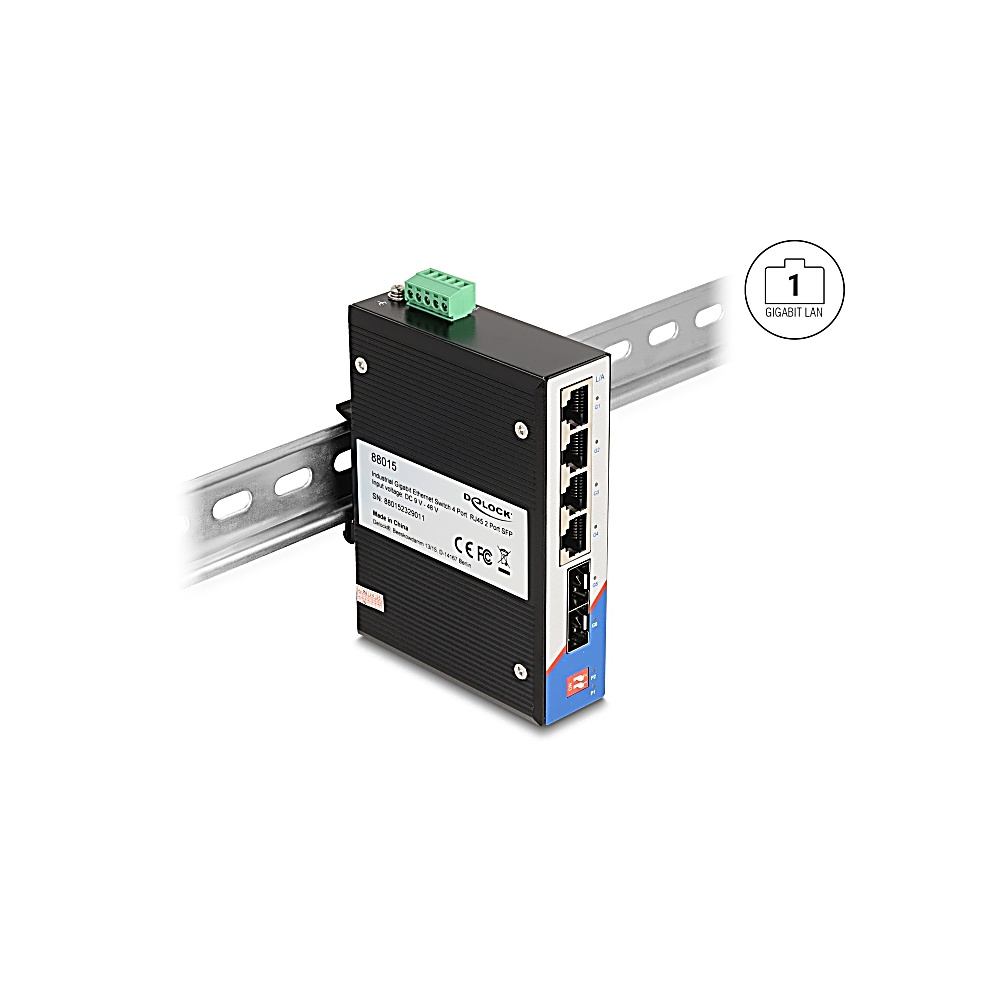 Czarny przemysłowy przełącznik ethernet zamontowany na metalowej szynie. Posiada kilka portów i zielone złącze, z ikoną 'GIGABIT LAN'.