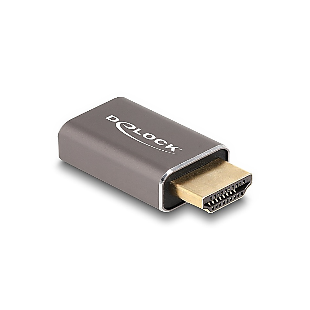 Szary adapter HDMI Delock. Złącze jest złote. Adapter znajduje się na białym tle.