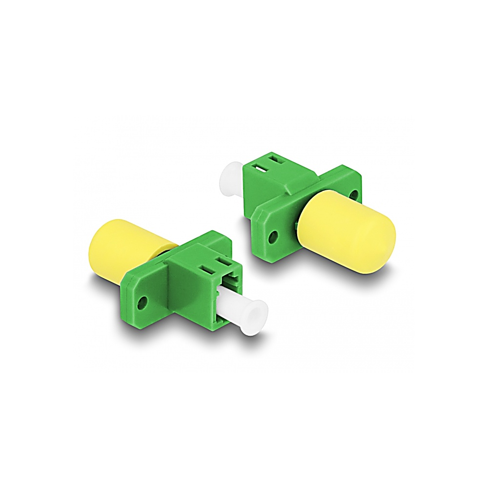 Dos conectores de fibra óptica verdes y amarillos sobre fondo blanco. Cada uno tiene un cilindro amarillo y una pieza final blanca.