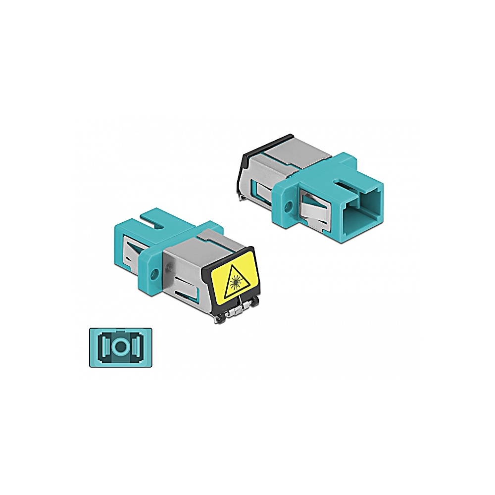 Dos conectores de fibra óptica. Uno tiene una etiqueta de advertencia. Un pequeño icono de conector está abajo a la izquierda.