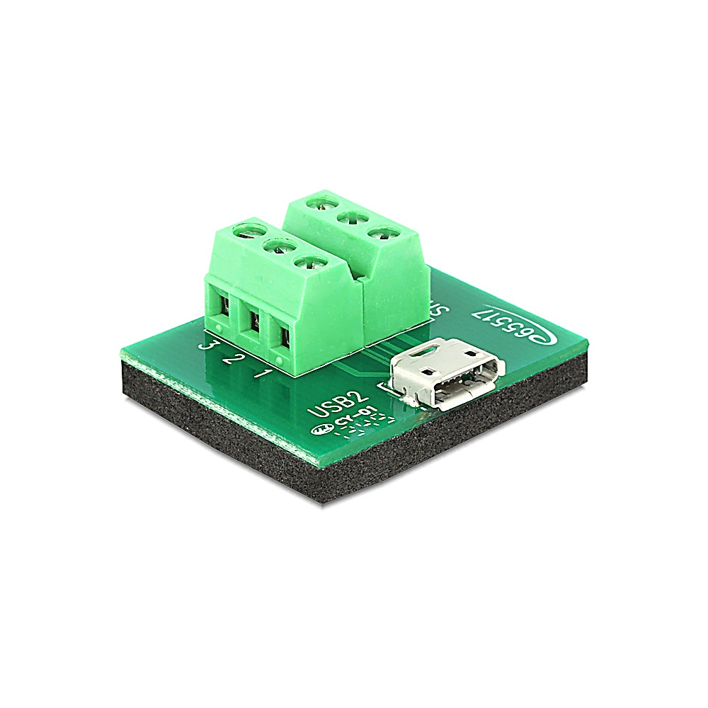 Un circuito stampato verde con morsettiera verde, porta USB e base in schiuma nera. Sfondo bianco.