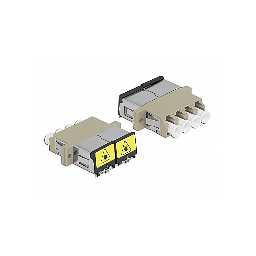 Due connettori in fibra ottica beige su bianco. Ognuno ha più porte ed etichette di avvertimento gialle.