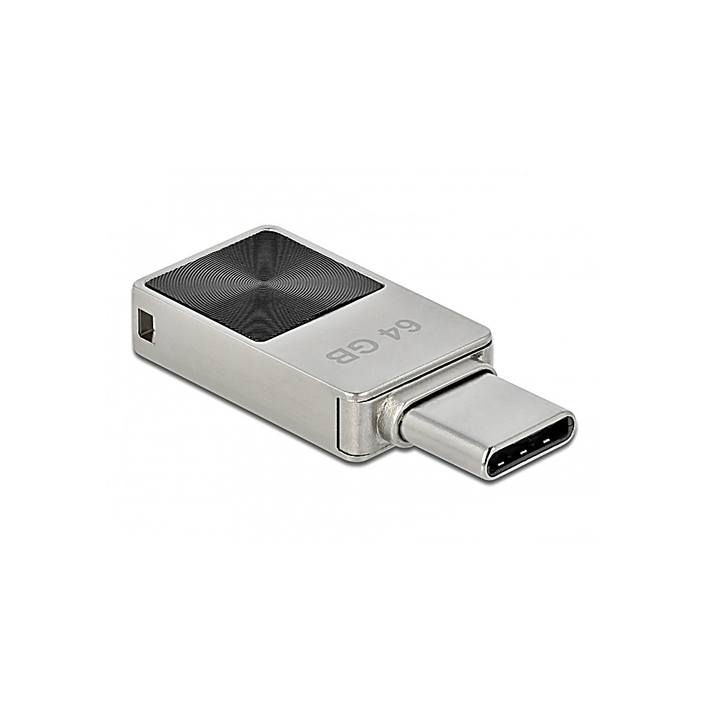Srebrny pendrive USB-C. Ma metalowy korpus z teksturowanym czarnym kwadratem na górze. Na dysku widnieje napis '64 GB'.