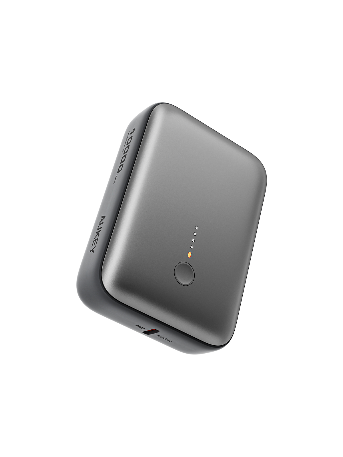 Un power bank Aukey grigio con quattro spie luminose e un pulsante di accensione, con la scritta '10000 mAh' sul lato.
