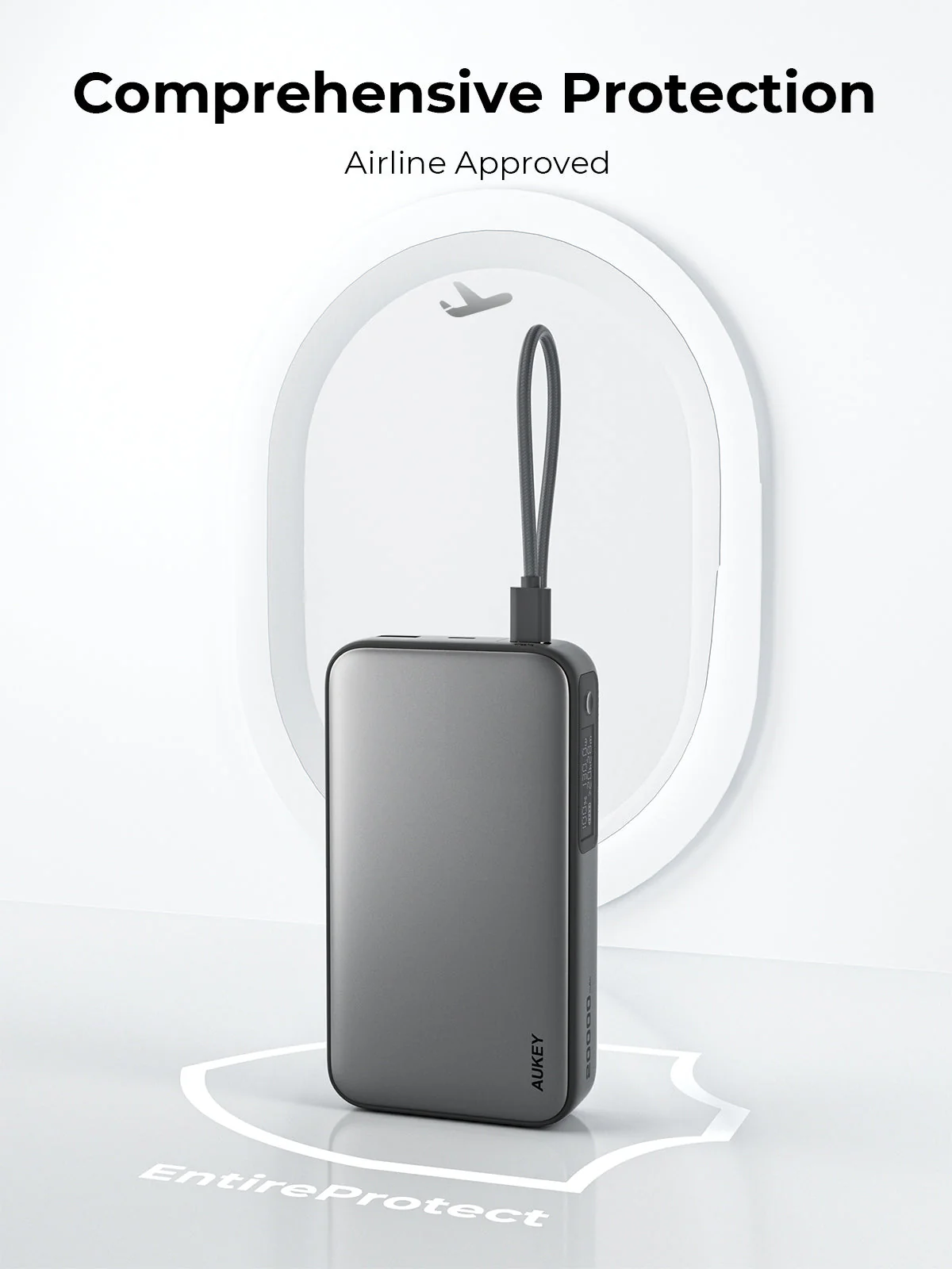 Un power bank gris con una correa negra se muestra sobre un fondo blanco. El texto 'Protección Integral' está arriba.