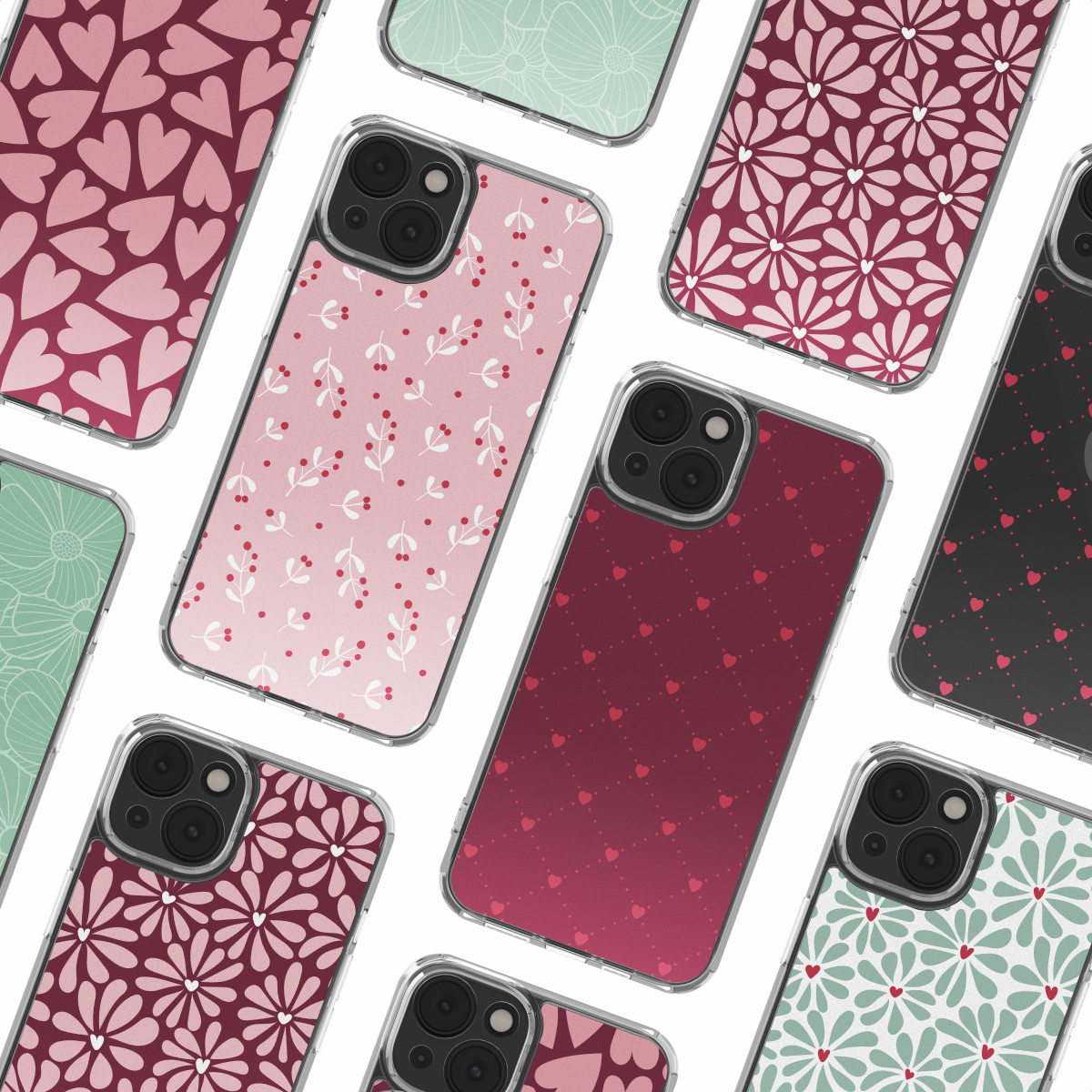 Variété d'étuis de téléphone avec différents motifs. Motifs floraux, de cœur et de baies roses, rouges et verts sur fond blanc.