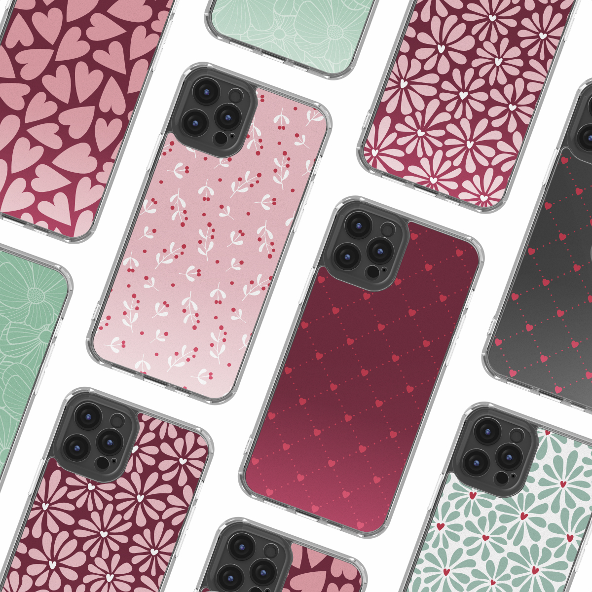 Un assortimento di custodie per telefoni con vari motivi come cuori e disegni floreali nei colori rosa, rosso e verde, su sfondo bianco.
