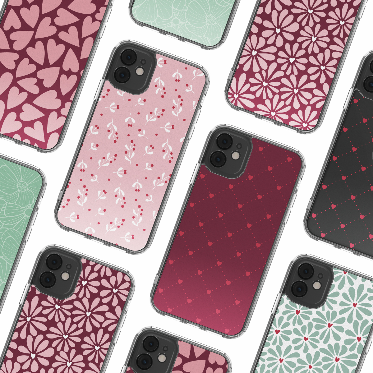 Diversi smartphone con varie custodie decorative. I motivi includono cuori, fiori e foglie nei colori rosa, rosso e verde.