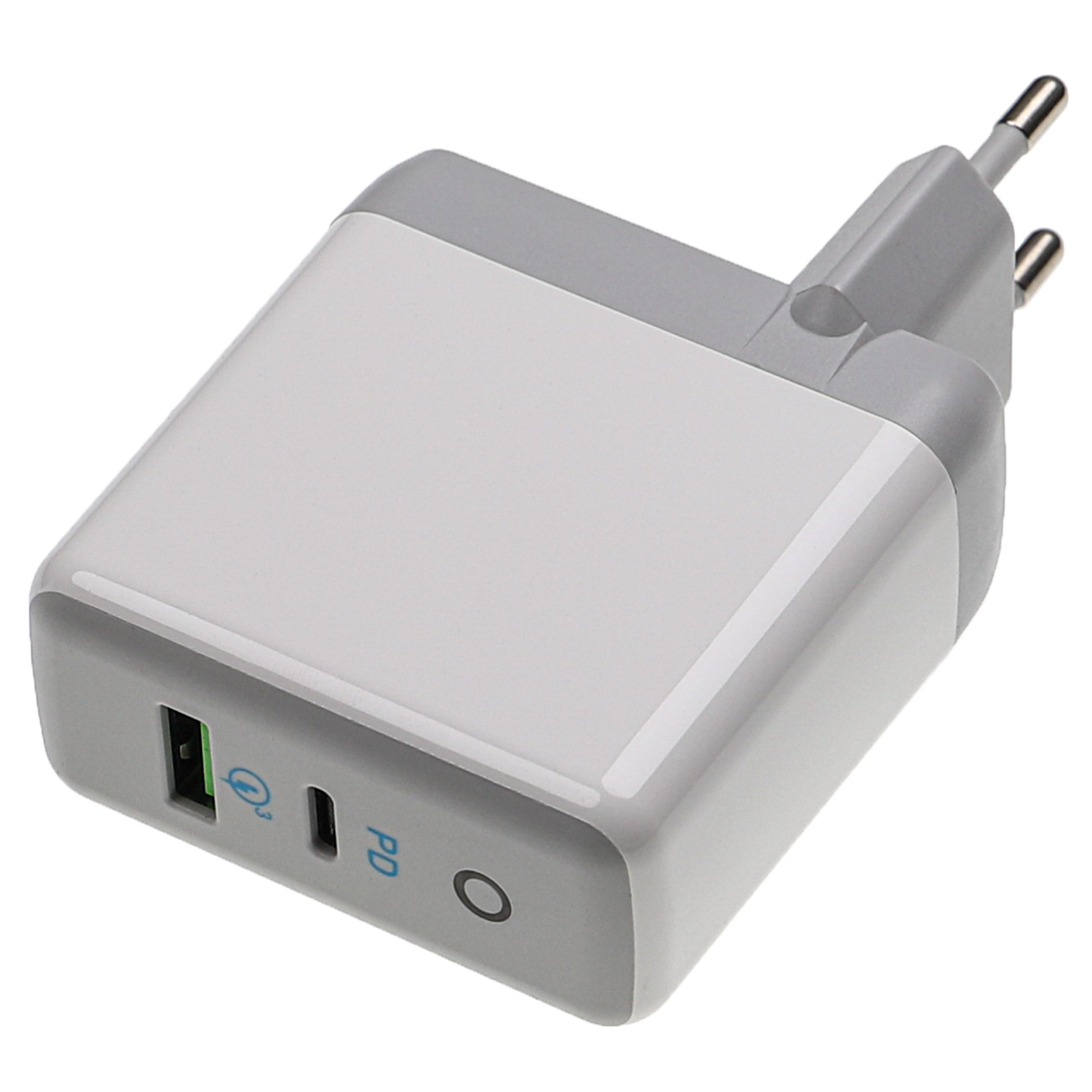 Ein weißes und graues Netzteil. Es hat zwei Stifte und einen USB-Anschluss. Der Hintergrund ist weiß.