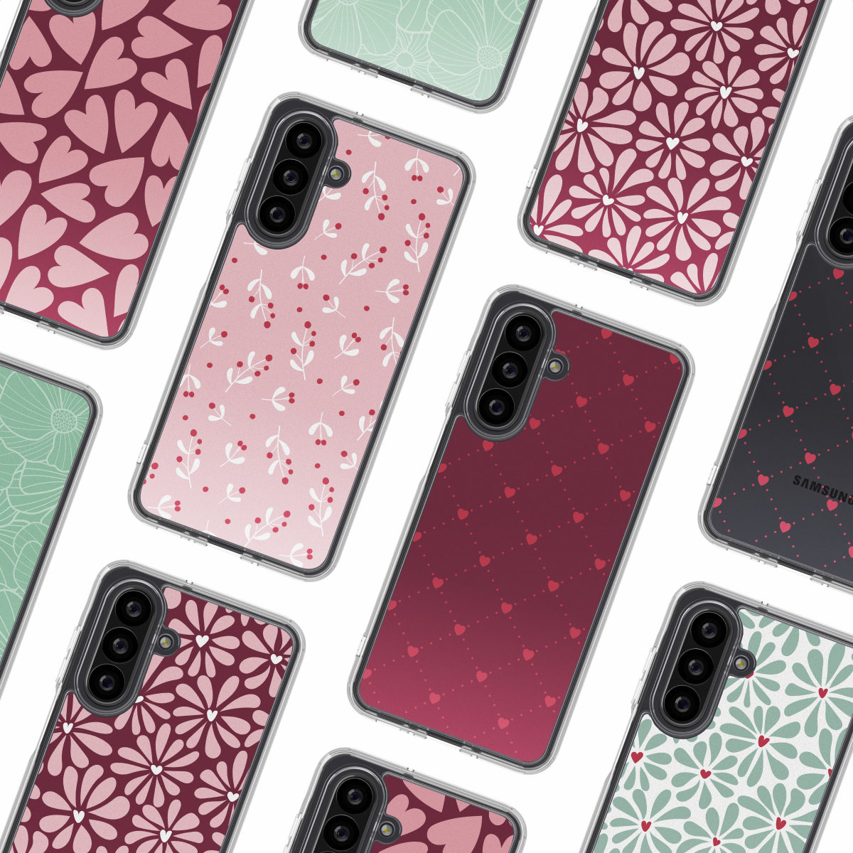 Verschillende telefoonhoesjes met verschillende patronen zoals harten, bloemen en bladeren in roze, rood en groen op een witte achtergrond.