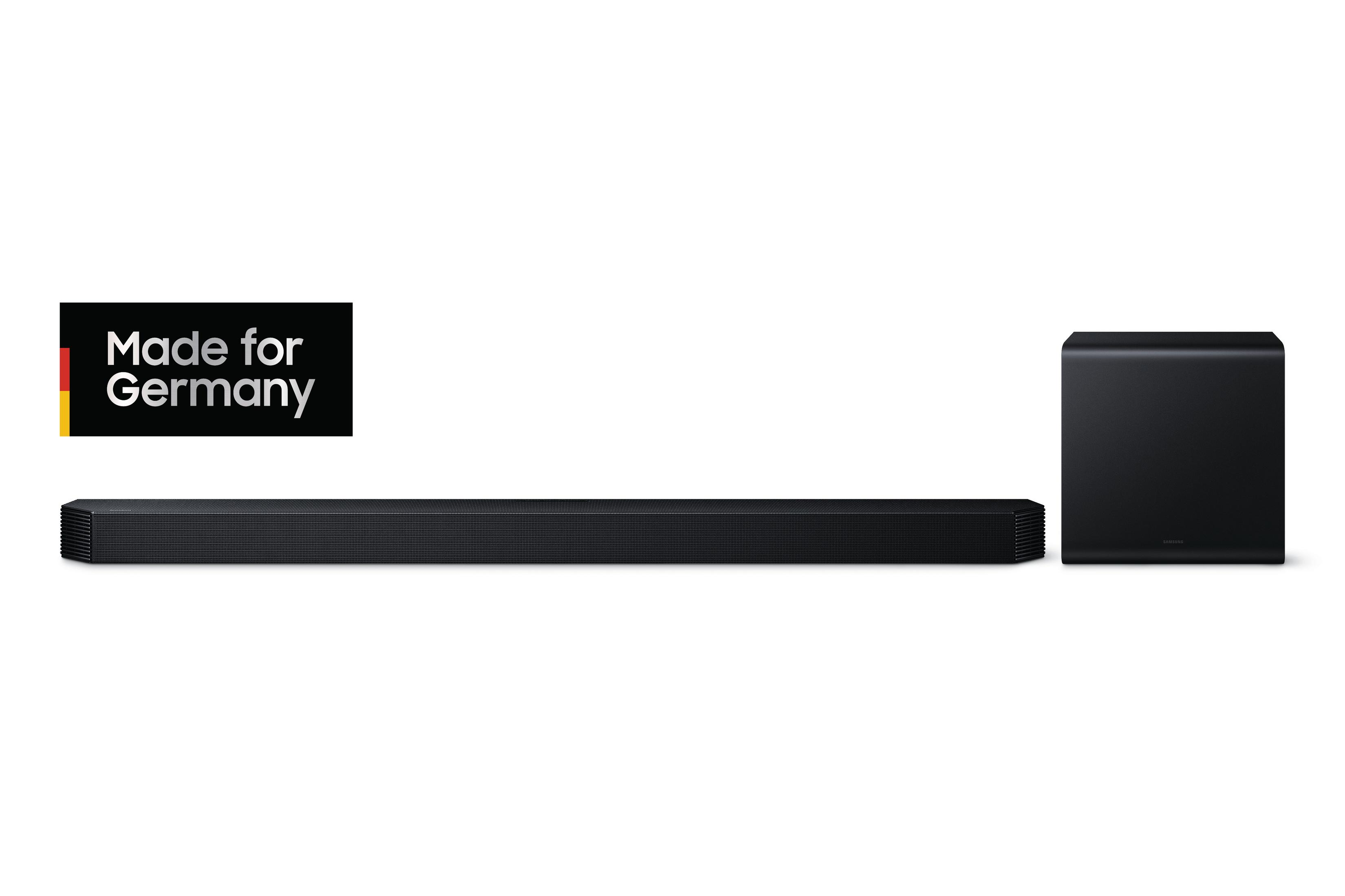 Ein schwarzes Soundbar- und Subwoofer-Set. Ein Logo sagt 'Made for Germany'. Weißer Hintergrund.
