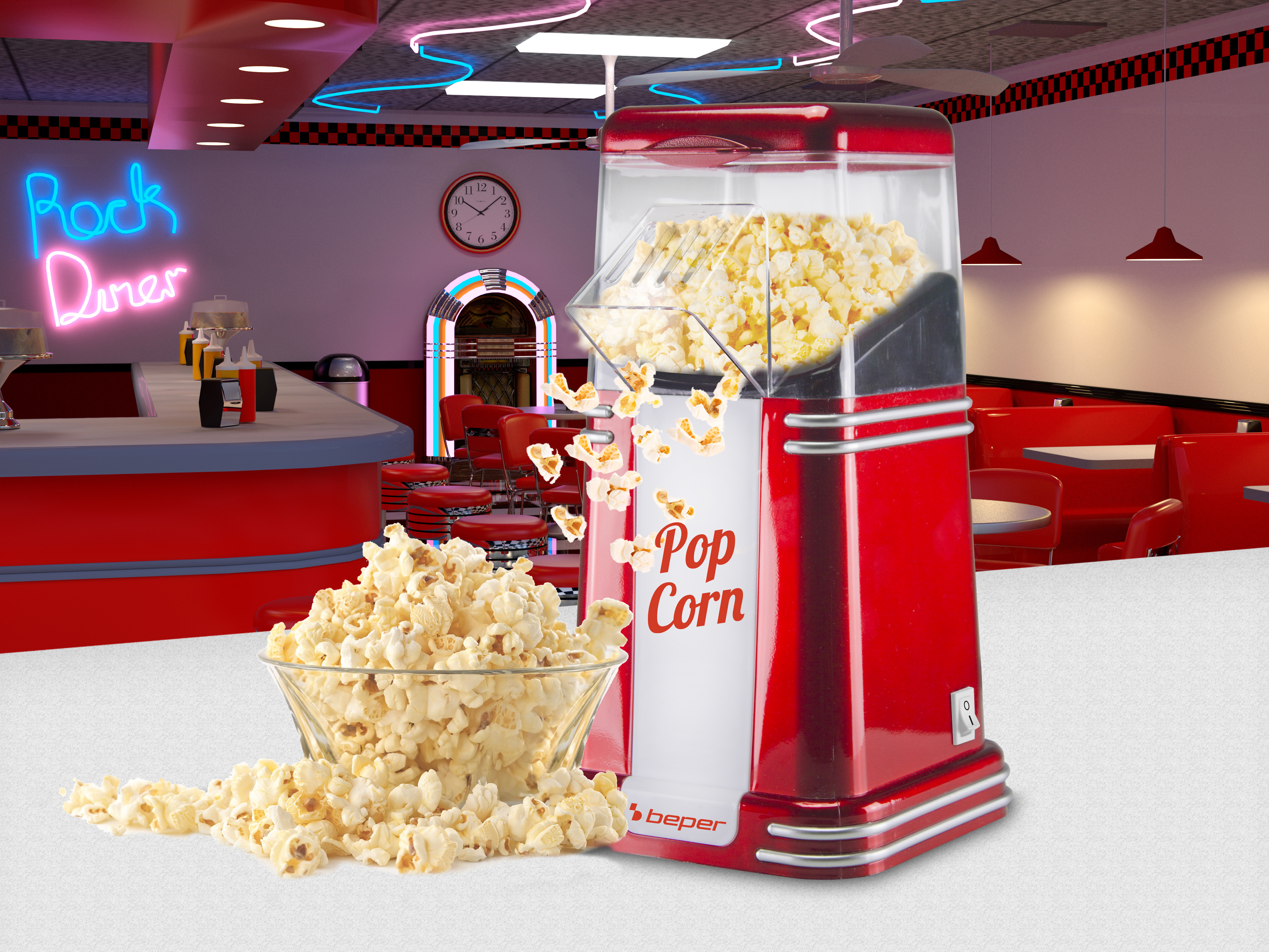 Una macchina per popcorn rossa in una tavola calda è circondata da popcorn. Un'insegna al neon dice 'Rock Diner'.