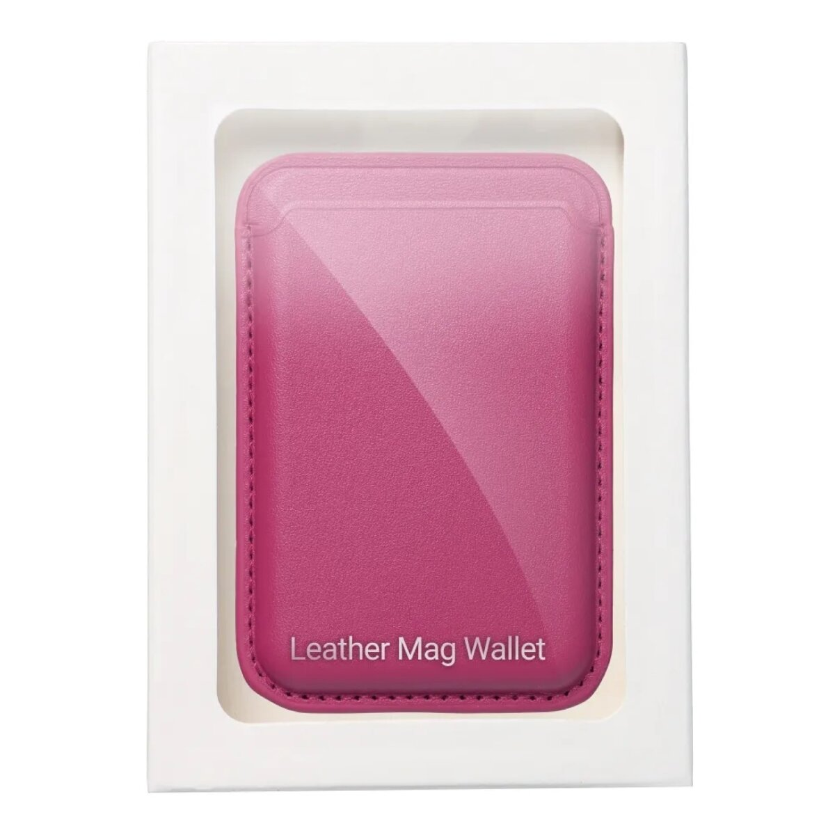 Un portafoglio Mag in pelle rosa è esposto in una scatola bianca. Il portafoglio è rettangolare con angoli arrotondati e riporta la scritta 'Leather Mag Wallet'.