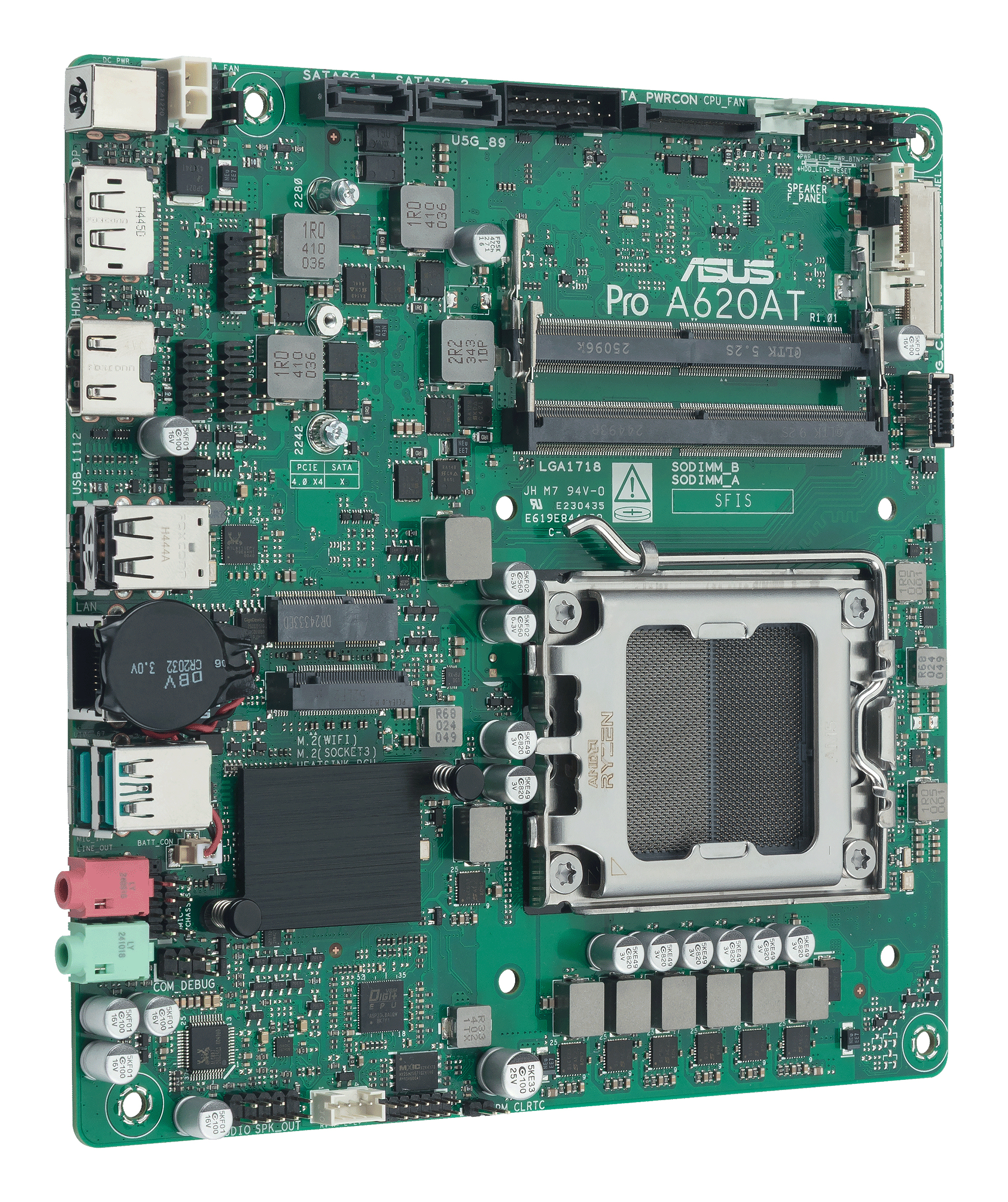 Çeşitli elektronik bileşenler, metin ve konektörler içeren yeşil devre kartı. CPU ve RAM yuvaları içerir.