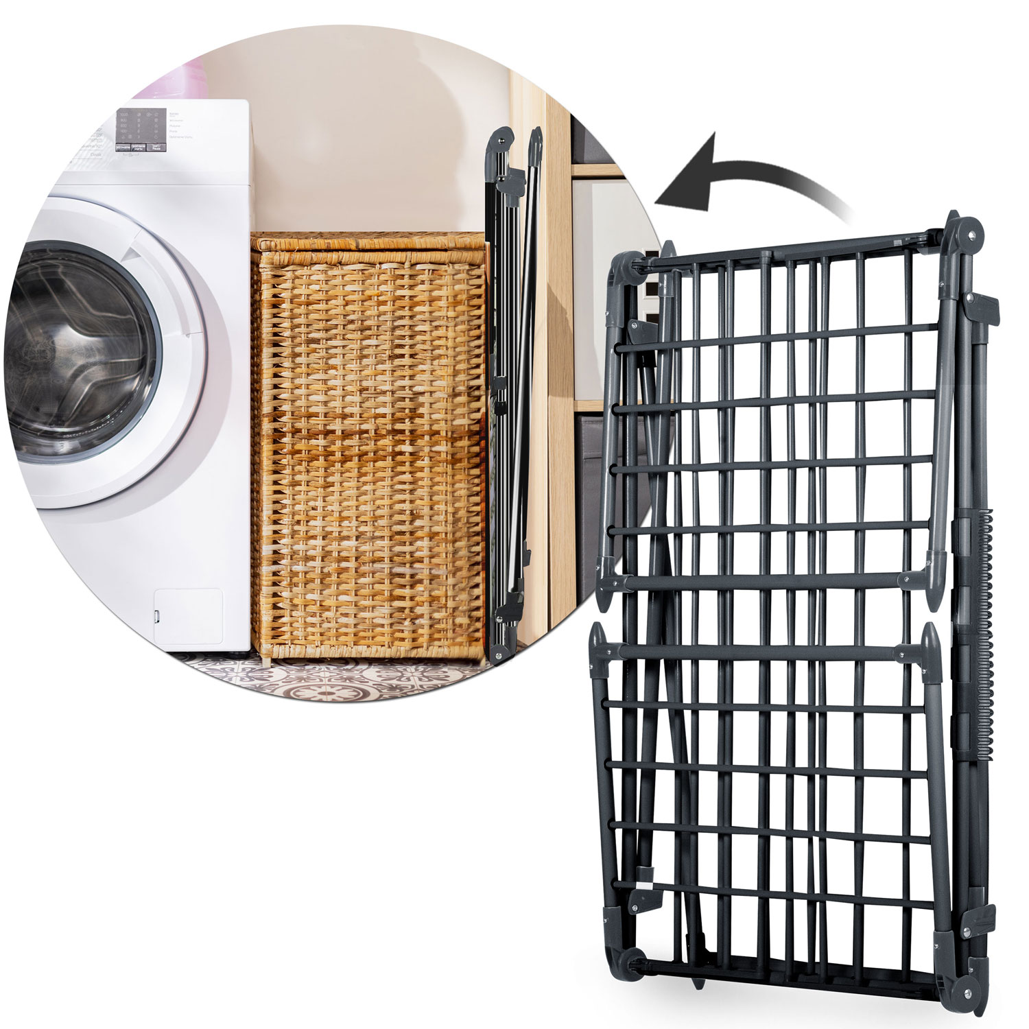 Stojak do suszenia jest otwarty, z pralką i wiklinowym koszem w tle. Strzałka pokazuje rozkładanie.