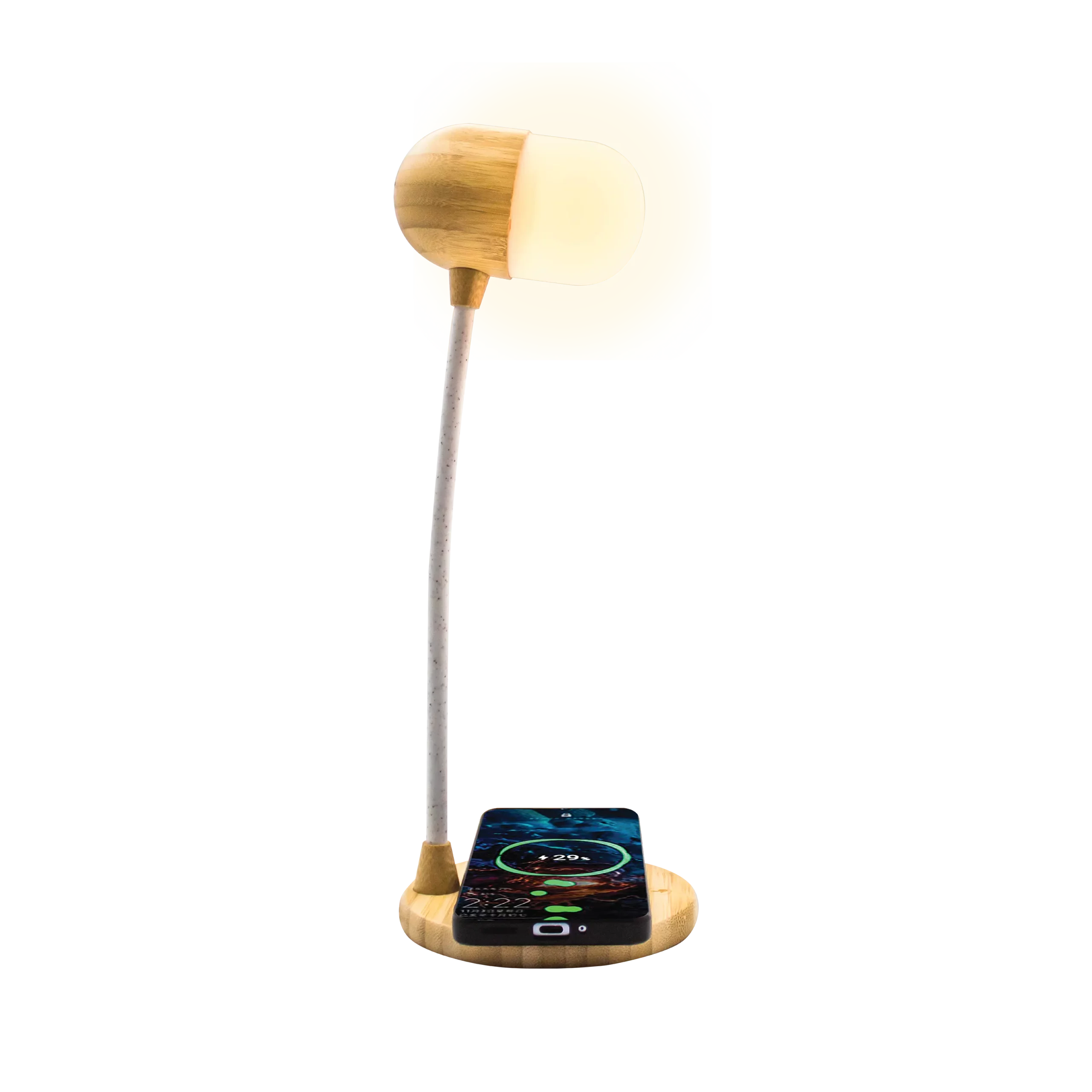 Una lampada da scrivania in legno con un telefono in carica sulla sua base. Lo schermo mostra lo stato di carica.