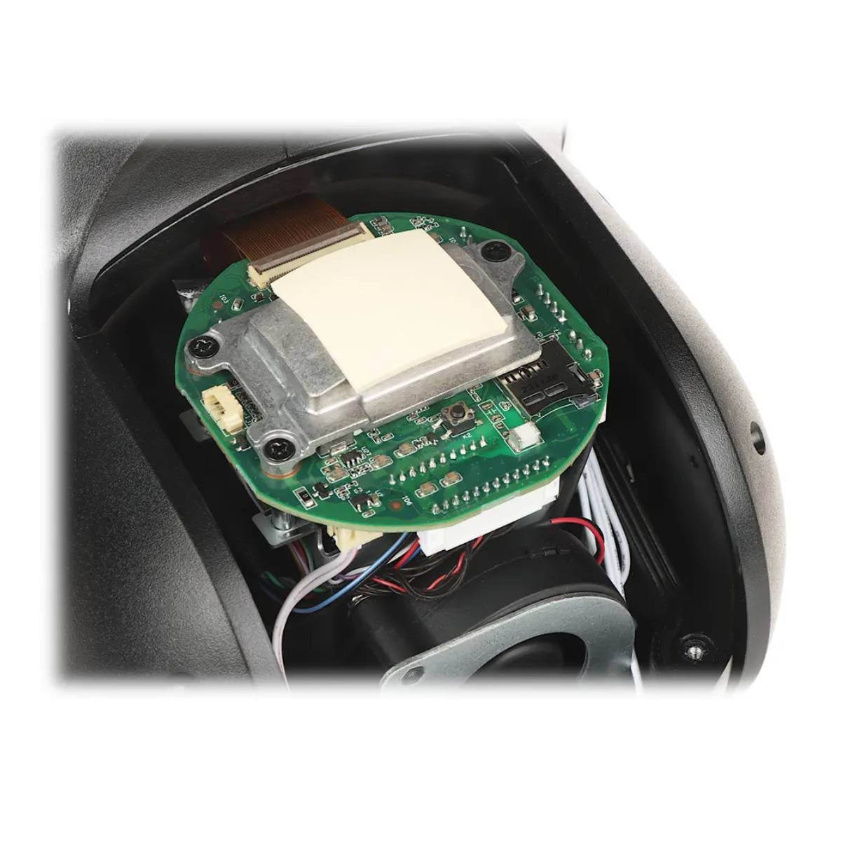 Primo piano di un circuito elettronico con componenti bianchi e argentati all'interno di un alloggiamento nero. Fili e connettori visibili.