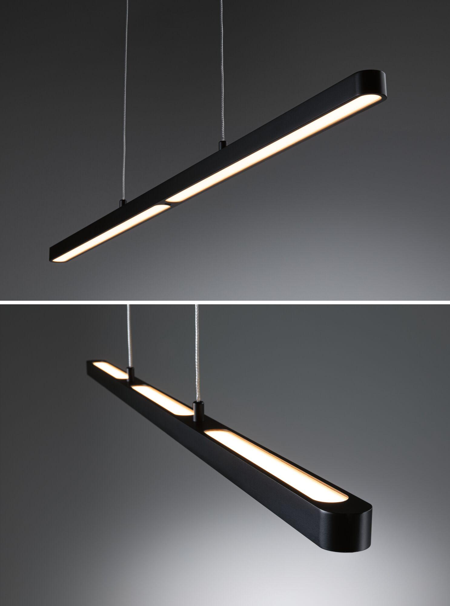 Dwie czarne, prostokątne lampy LED są zawieszone pod sufitem. Każda lampa ma jasną, białą poświatę. Tło jest szare.