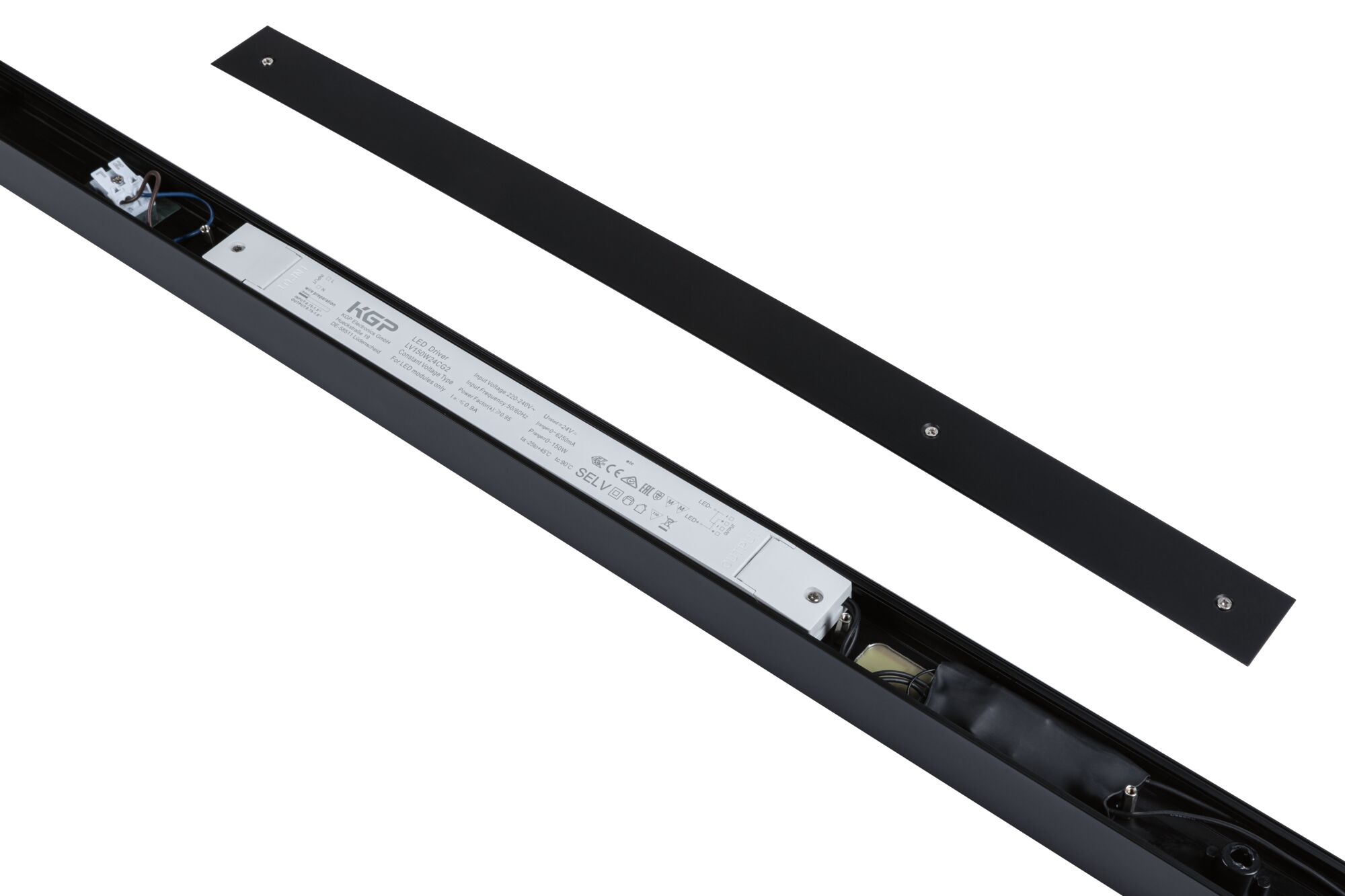 Schwarze LED-Leuchte mit abgenommenem Deckel. Im Inneren befinden sich Netzteil, Drähte und elektronische Komponenten.