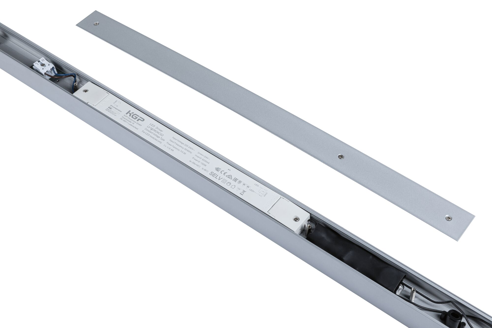 Eine silberne LED-Leuchte wird zerlegt mit ihren Komponenten gezeigt. Die Teile umfassen ein Metallgehäuse und ein Netzteil.