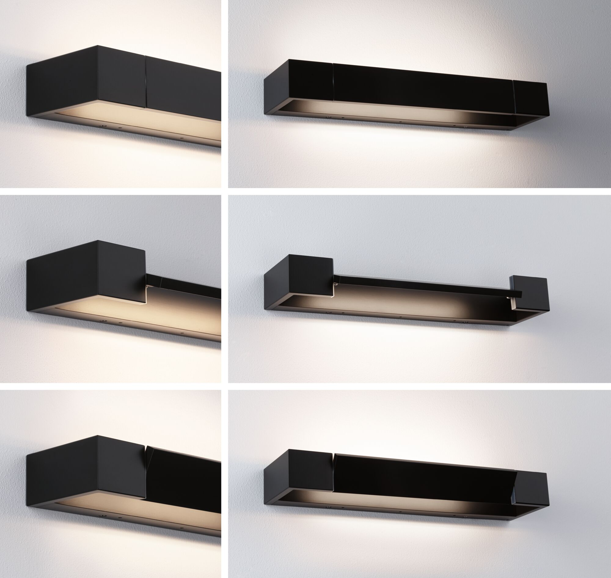 Eine schwarze, rechteckige Wandleuchte an einer weißen Wand. Die Lampe strahlt ein warmes, weiches Licht nach unten ab.