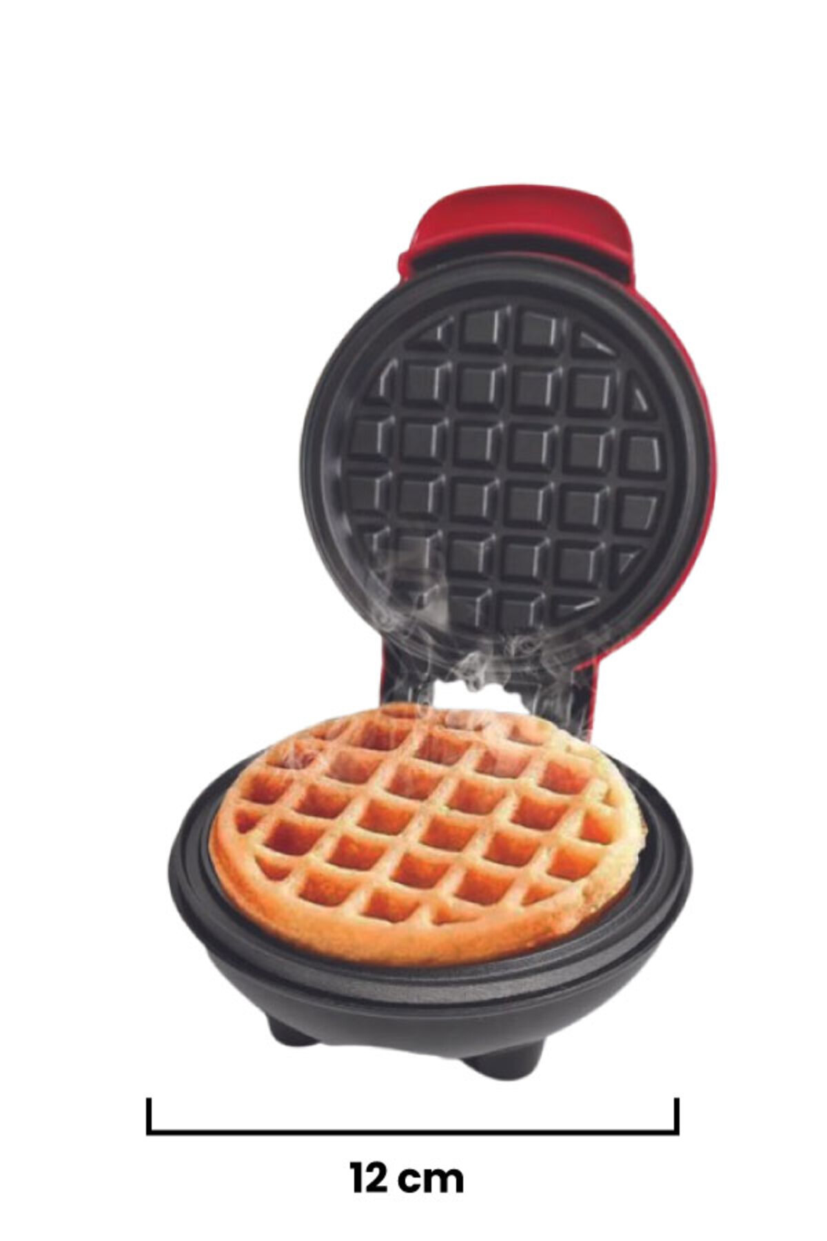 İçinde pişmiş bir waffle bulunan açık bir waffle makinesi. Makine kırmızı ve siyahtır. Waffle'dan buhar yükselir.