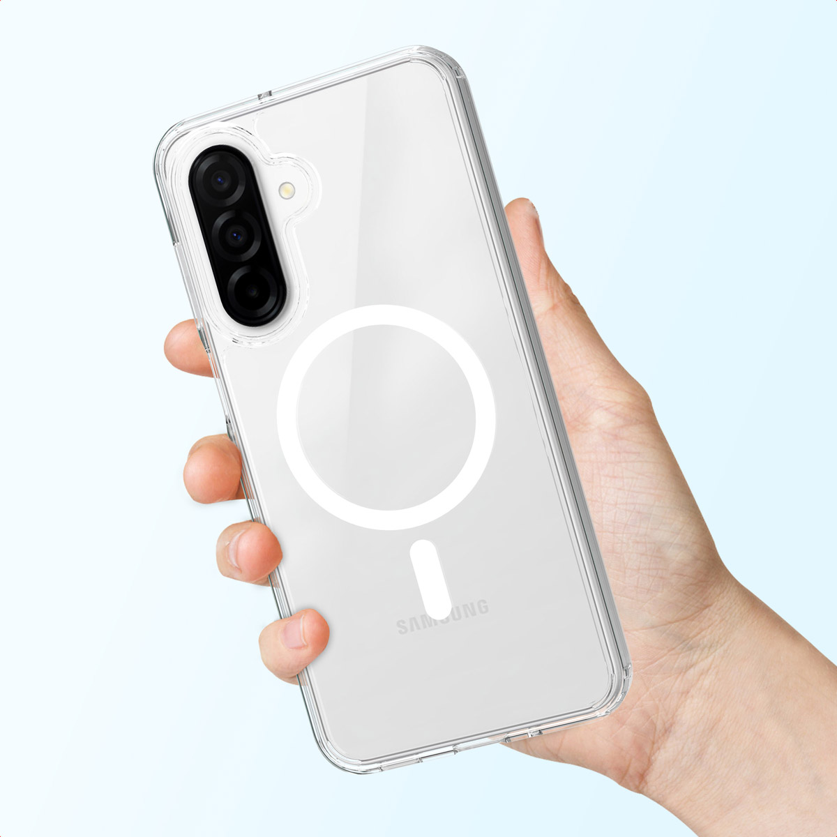 Una mano tiene una custodia trasparente per telefono su uno sfondo azzurro. La custodia ha una fotocamera e un anello magnetico bianco.