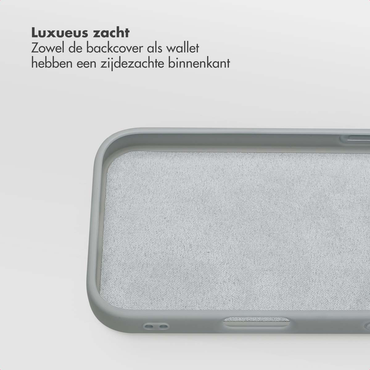 Gros plan d'une coque de téléphone grise. L'intérieur est doux et texturé, l'extérieur est lisse. Le fond est blanc.
