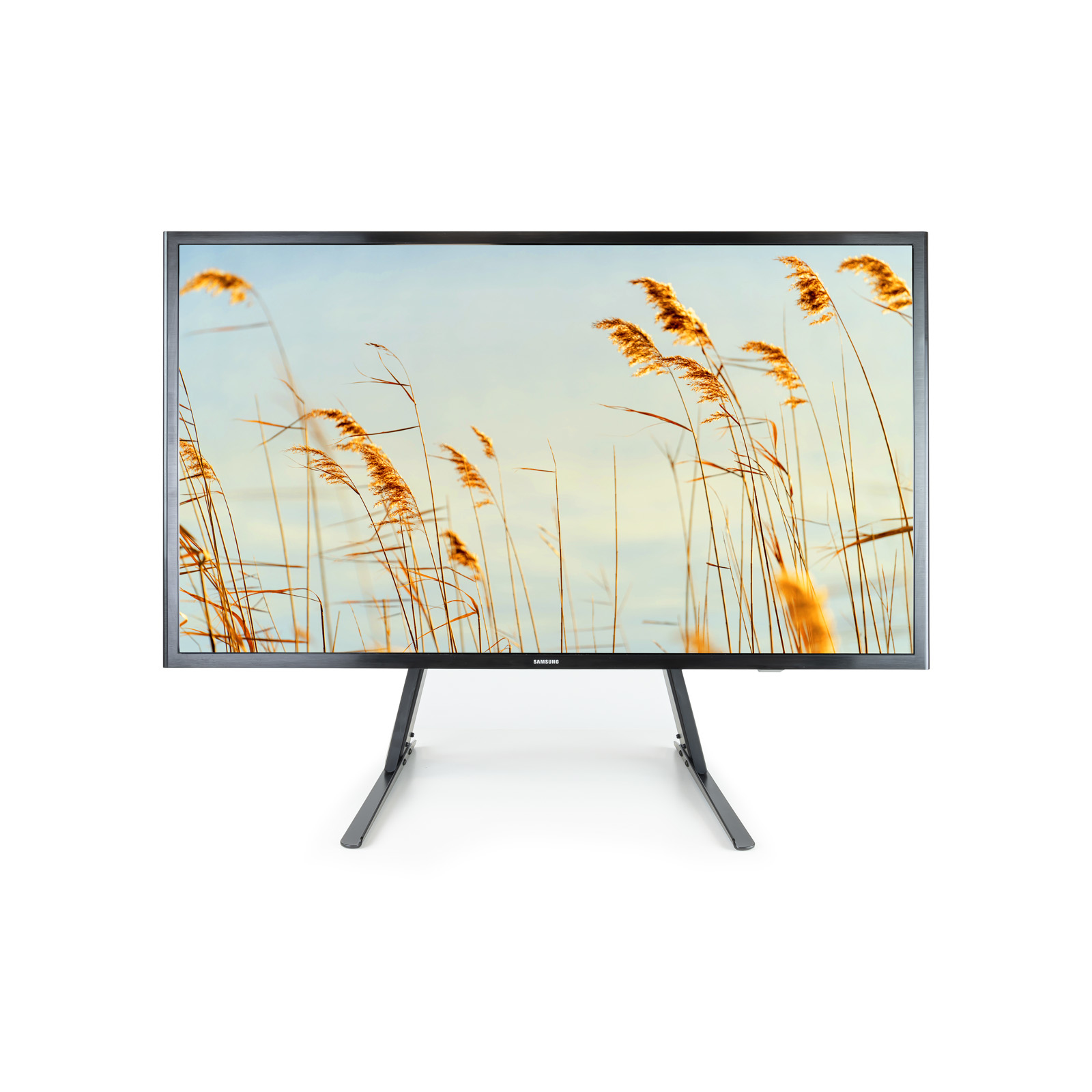 Ein Samsung-Fernseher zeigt eine Naturszene mit hohem, goldenem Gras vor einem hellblauen Himmel, montiert auf einem Ständer.