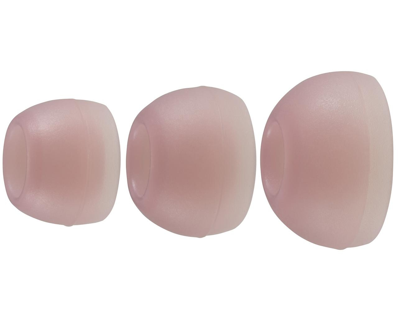 Tre gommini auricolari rosa chiaro di diverse dimensioni sono visualizzati su sfondo bianco. Sono lisci e hanno una forma arrotondata.