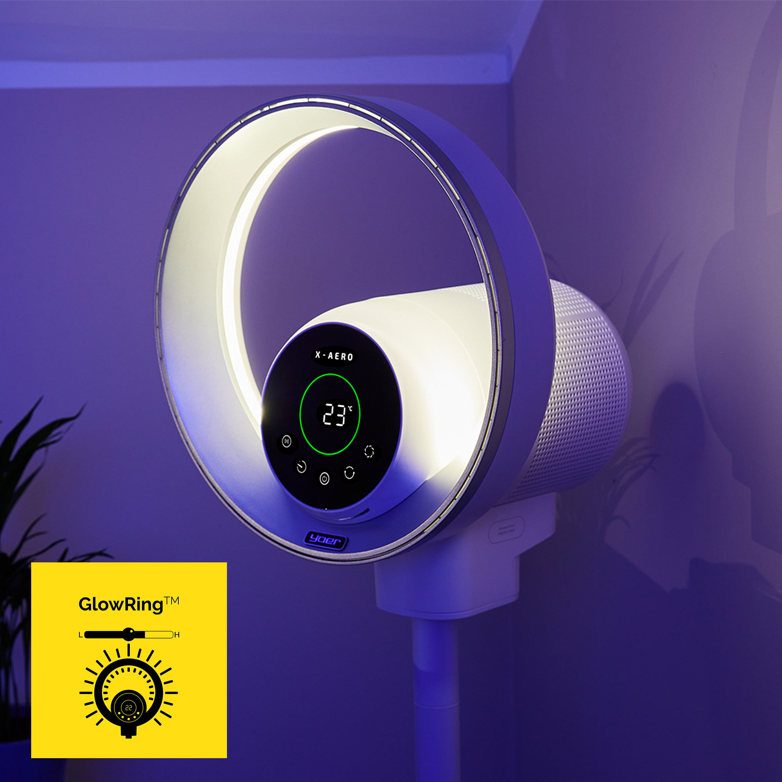 Biało-szary wentylator z świecącym pierścieniem, wyświetlający 23 stopnie. Żółty kwadratowy grafika w lewym dolnym rogu.