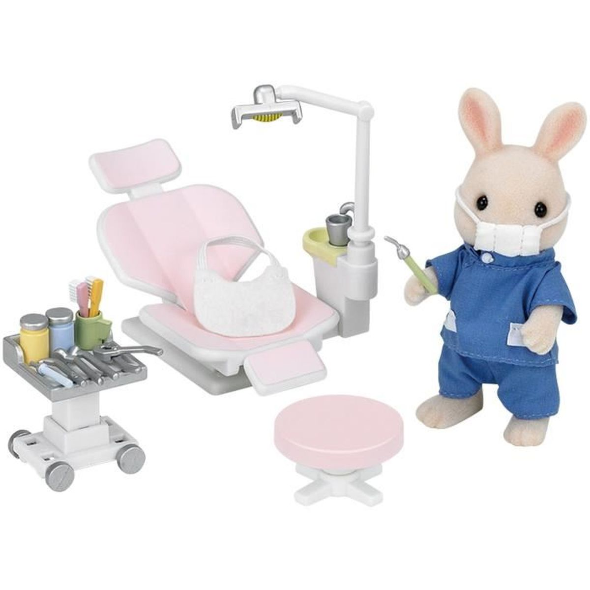 Uno studio dentistico giocattolo con un coniglio medico. Include poltrona odontoiatrica, strumenti, sgabello e lampada.