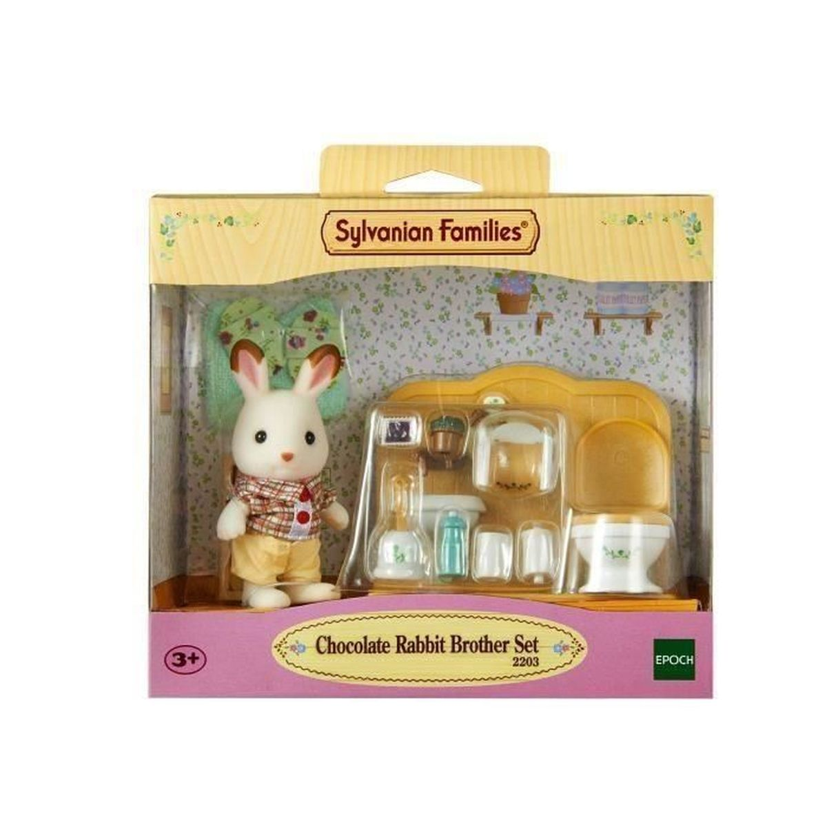 Un set Sylvanian Families Chocolate Rabbit Brother. Include una figura di coniglio e accessori da bagno in miniatura. La scatola è rosa e verde.