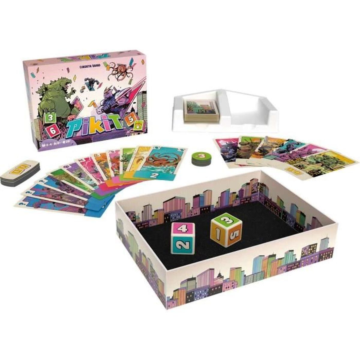 Ein Brettspiel-Set mit Karten, Würfeln und einer Schachtel mit Skyline-Kunst. Eine Schachtel mit dem Wort 'Pikit' ist ebenfalls sichtbar.