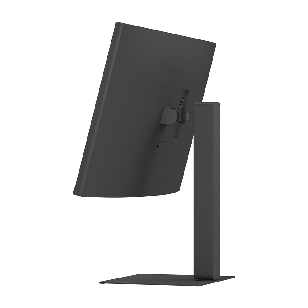 Czarny monitor komputerowy, widok z tyłu. Monitor jest ustawiony pod kątem, pokazując swoją podstawę i połączenia.