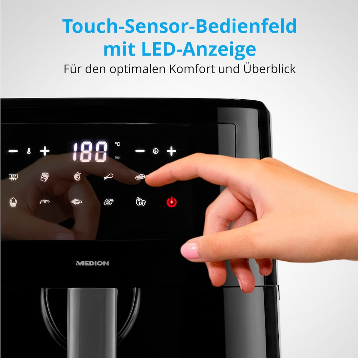 Ręka dotyka czarnego panelu frytkownicy powietrznej. Panel pokazuje ustawienia i temperaturę 180 stopni. Tekst brzmi: 'Touch-Sensor-Bedienfeld'.