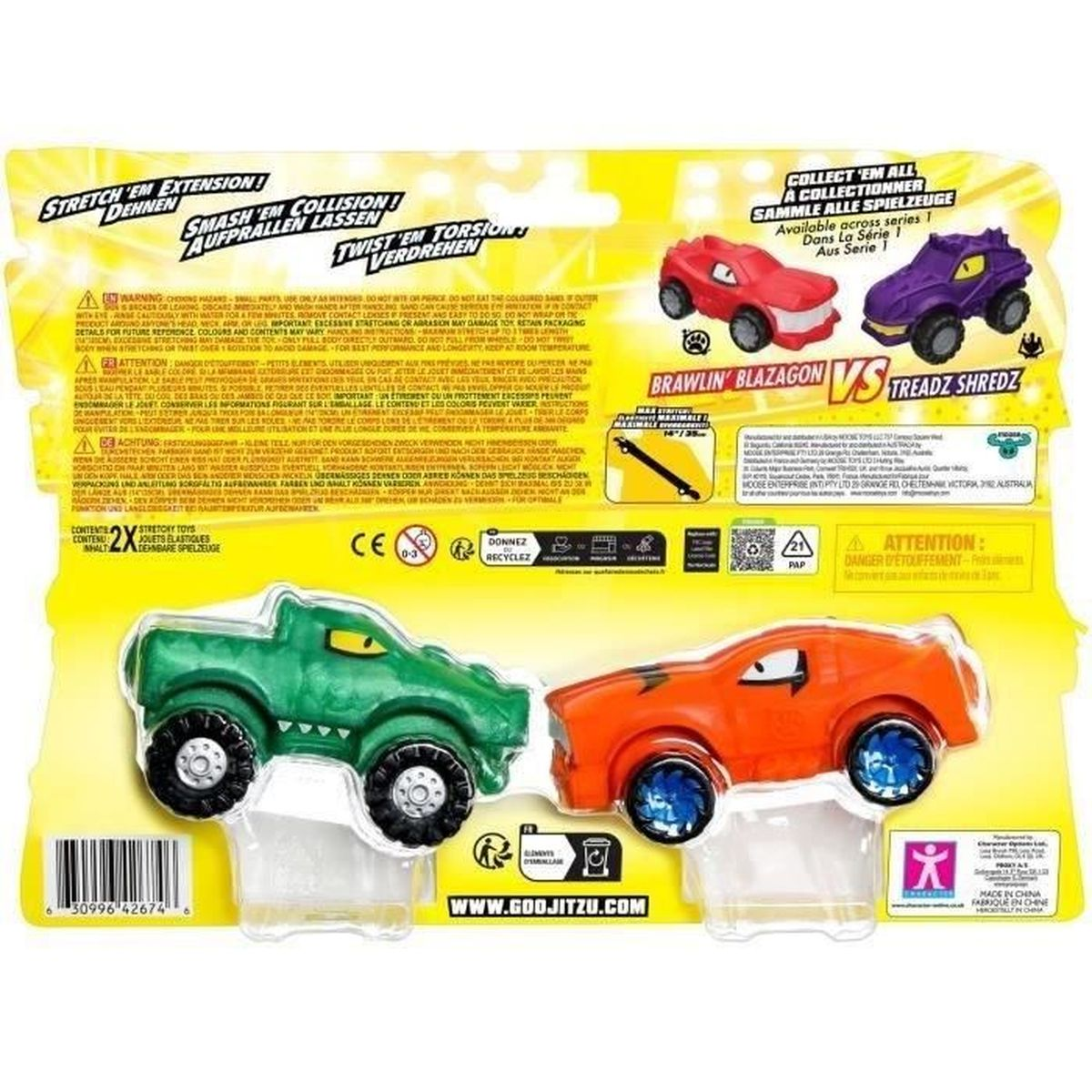 Spielzeugverpackung mit zwei Monstertrucks: grün und orange, mit Markennamen und Warnhinweisen.