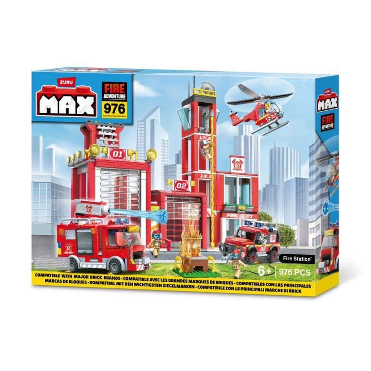 Un set di giocattoli della stazione dei pompieri con autopompe, un elicottero e un edificio. La scatola dice Max Fire Adventure 976, compatibile con i marchi di mattoni.
