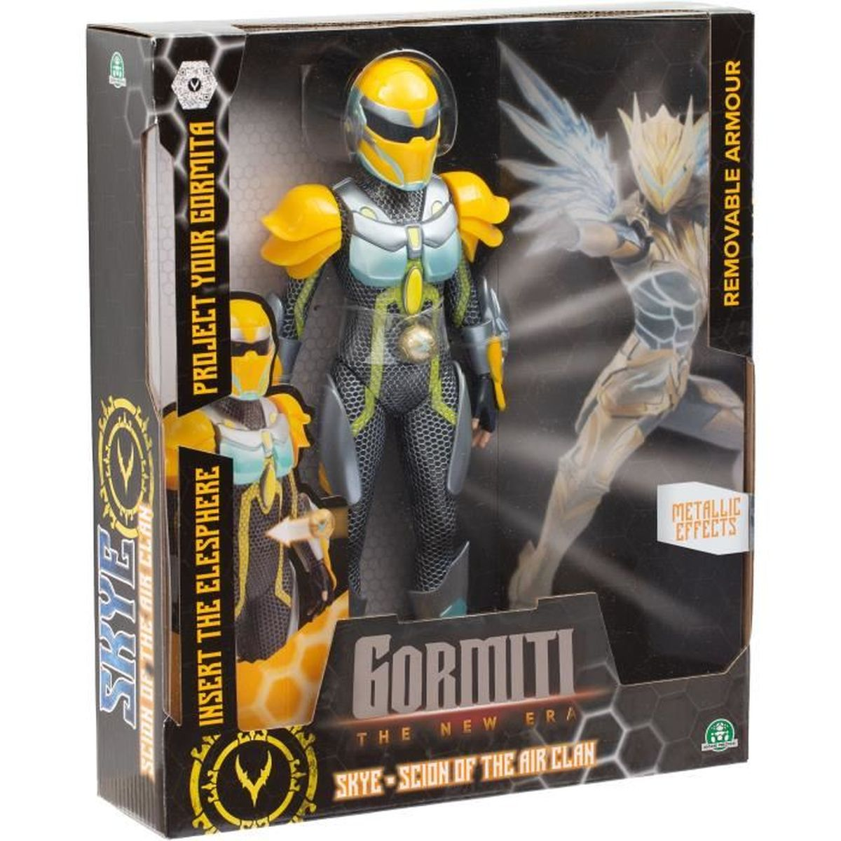 Eine Gormiti-Actionfigur in einer Box. Sie zeigt eine Figur in gelber und grauer Rüstung. Die Verpackung hat Text wie 'Skye' und 'Abnehmbare Rüstung'.