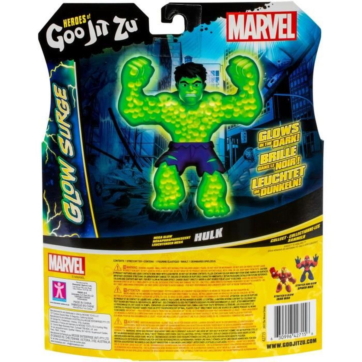 Hulk-Spielzeug auf einer Marvel Heroes of Goo Jit Zu-Verpackung. Hulk ist grün mit lila Shorts. Verpackung leuchtet im Dunkeln.