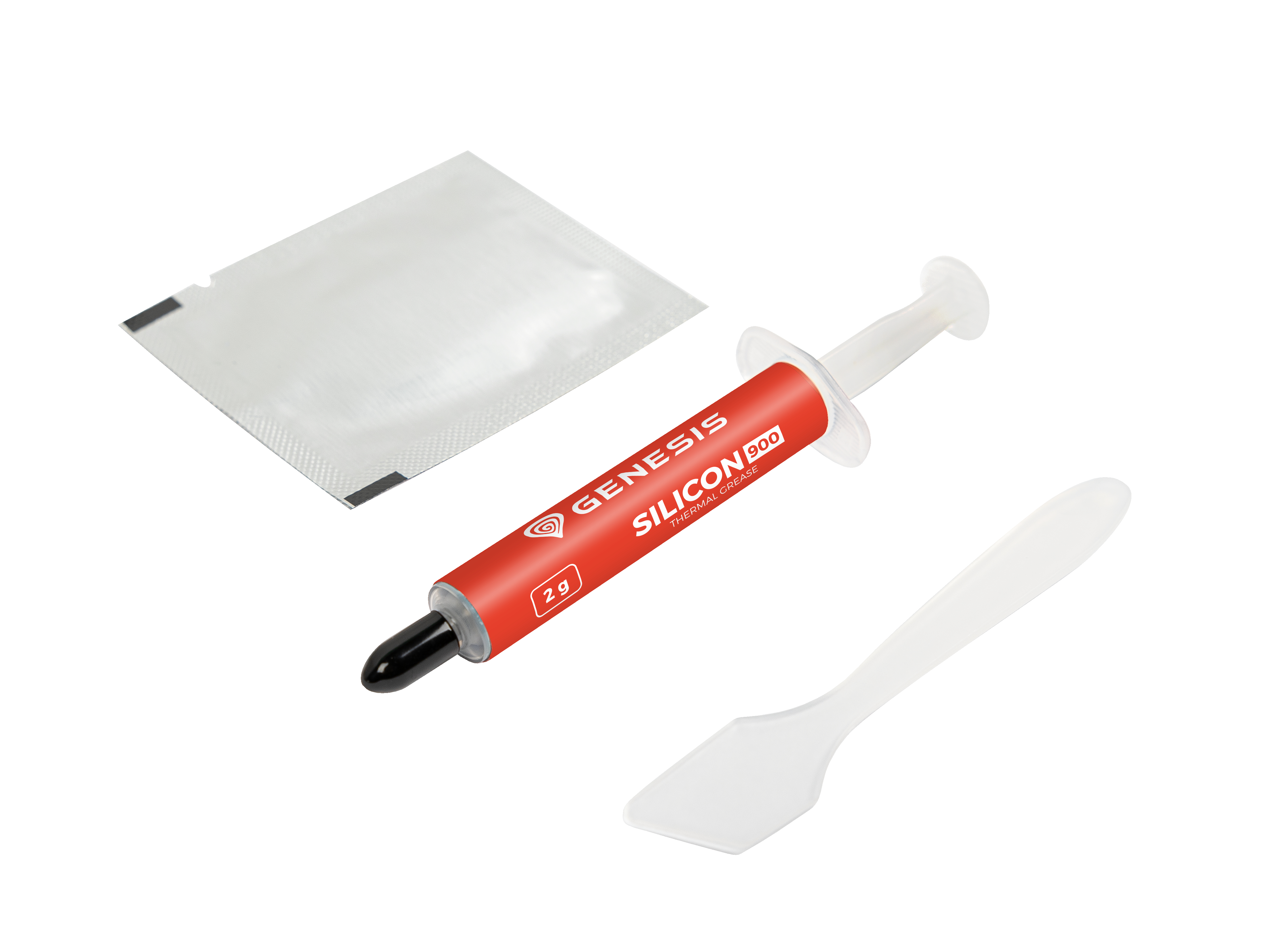 Eine rote Tube Wärmeleitpaste, ein weißes Päckchen und ein weißer Spatel auf weißem Grund.