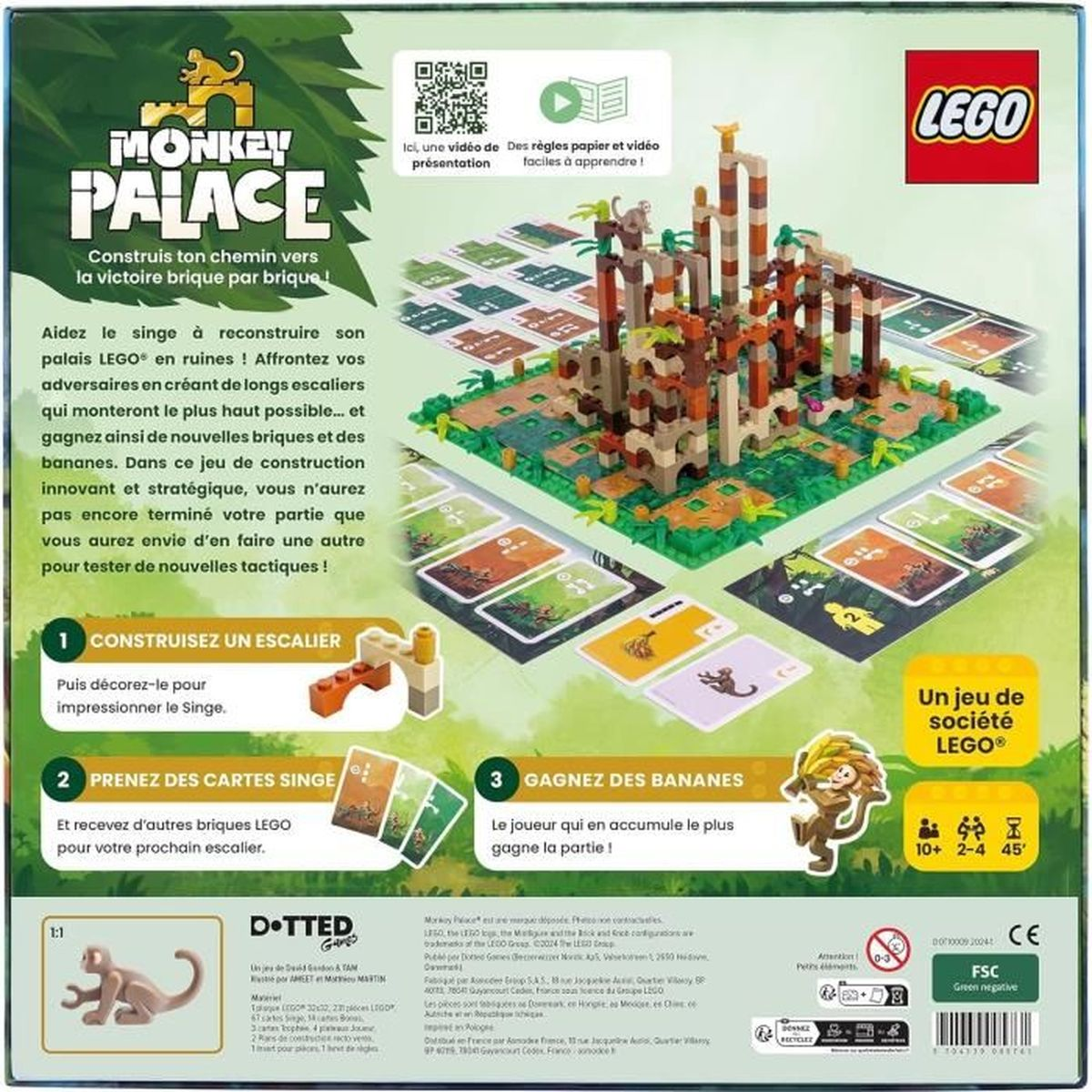 Lego Monkey Palace speldoos. Toont een gebouwde Lego-structuur, kaarten en tekst in meerdere talen.
