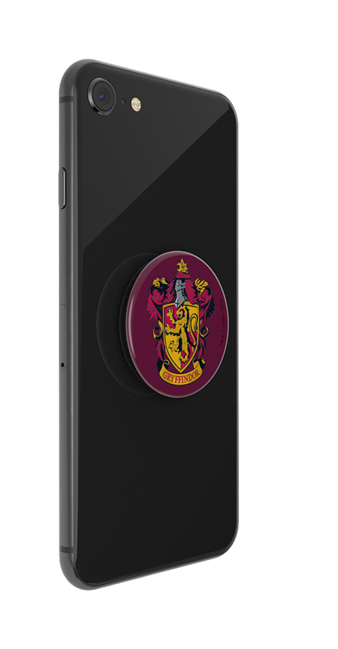 Teléfono negro con emblema de Gryffindor. El teléfono es vertical, el emblema es redondo y colorido. Fondo blanco.