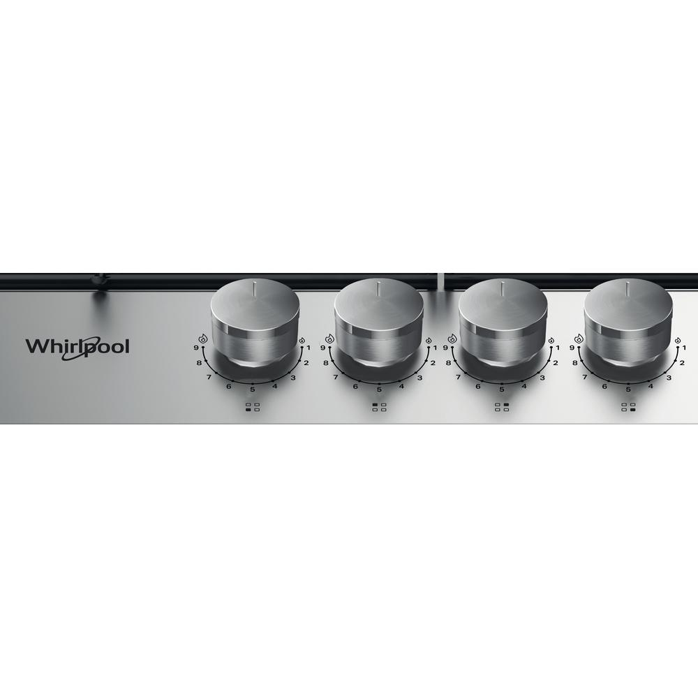 Nahaufnahme eines Whirlpool-Kochfelds. Vier silberne Knöpfe sind sichtbar. Das Whirlpool-Logo ist links.