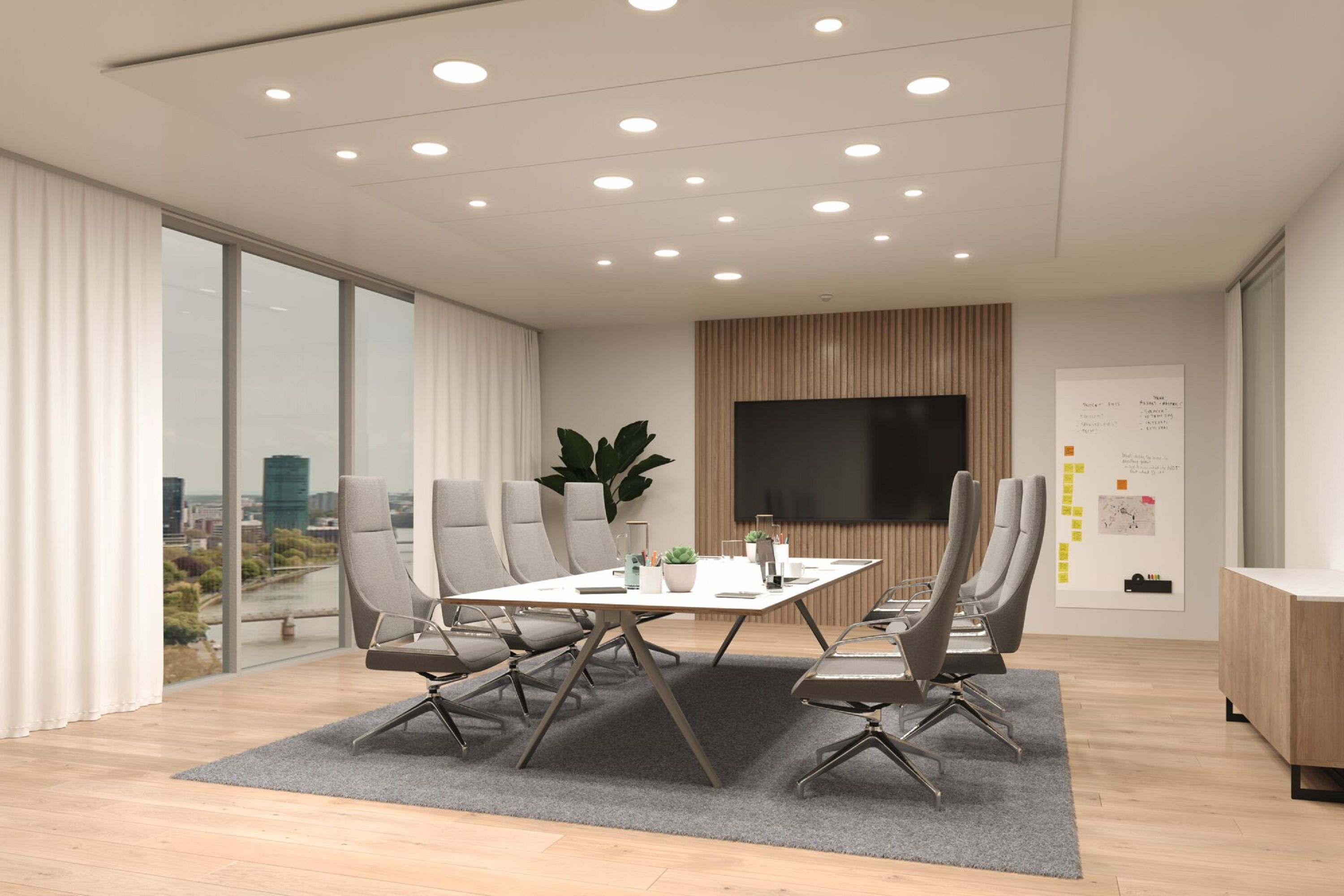 Konferenzraum mit Tisch, Stühlen, großem Fenster und Stadtblick. Pflanzen und eine Tafel sind ebenfalls vorhanden.