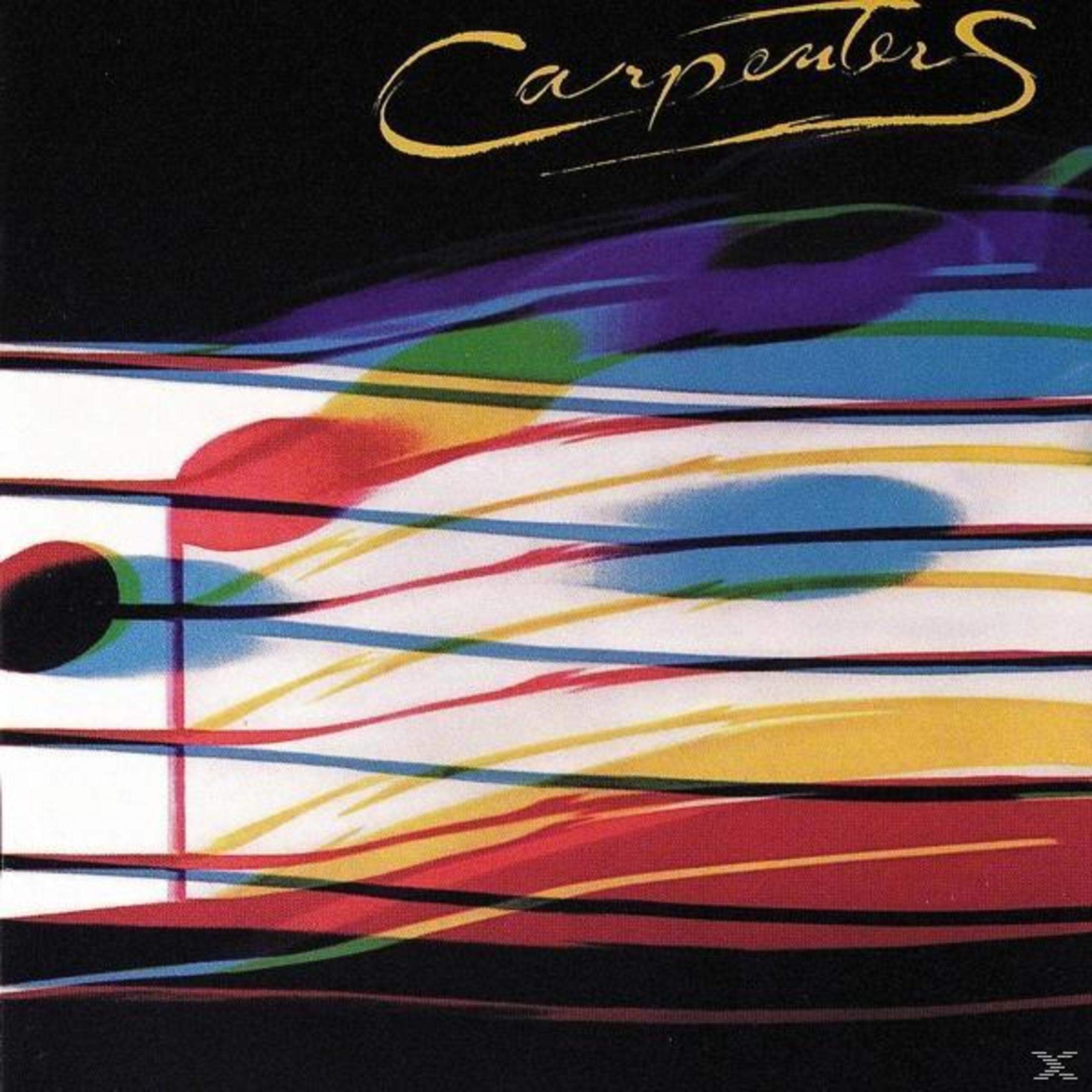 Albumhoes met zwarte achtergrond en abstracte kleurrijke lijnen. De bandnaam, Carpenters, is in goud geschreven.