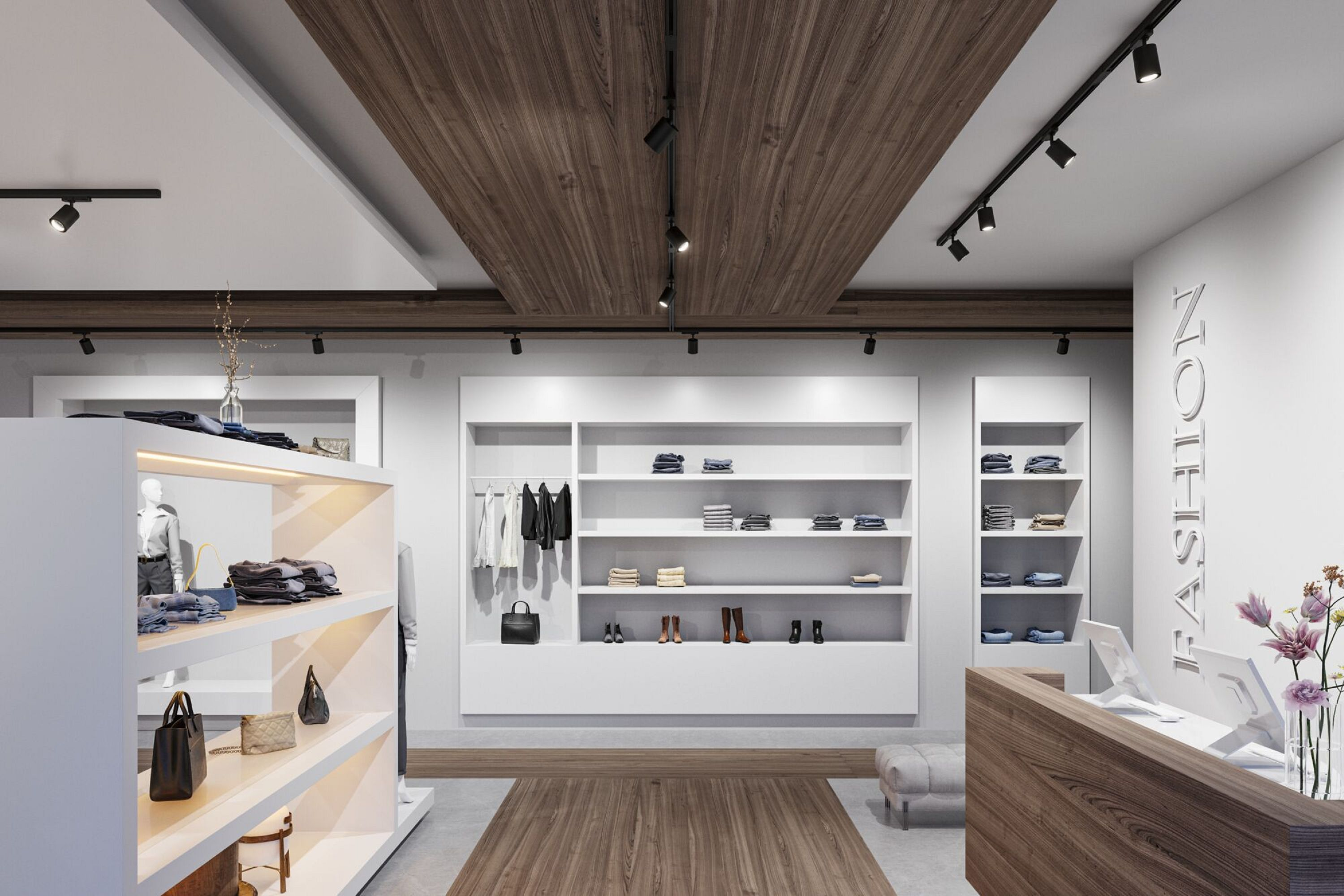 Wnętrze sklepu odzieżowego. Białe półki eksponują ubrania i akcesoria. Drewniany sufit i podłoga. Widoczny ladę kasową.