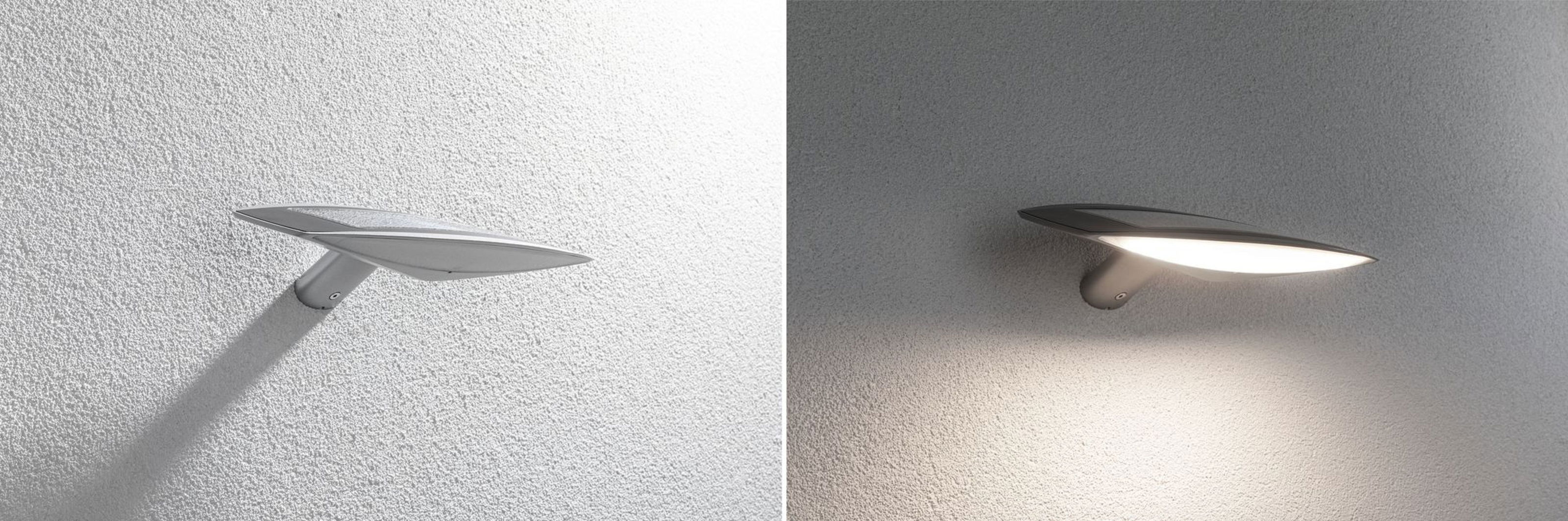 Zwei Wandlampen. Eine aus, eine an. Beide haben eine blattartige Form. Hintergrund sind strukturierte weiße und graue Wände.