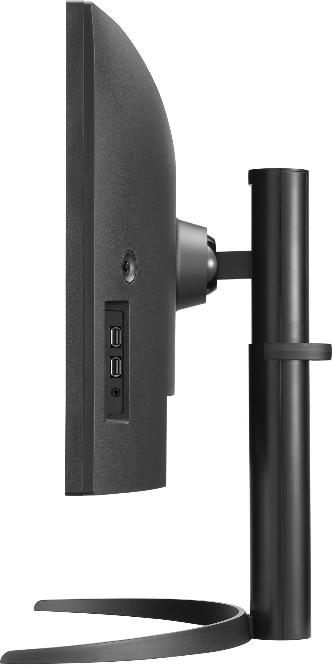 Widok z boku czarnego monitora komputera. Monitor stoi na czarnym stojaku. Z boku znajdują się porty.